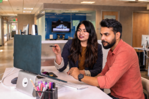 Prabjit Kaur reviewing an SEO and content audit document