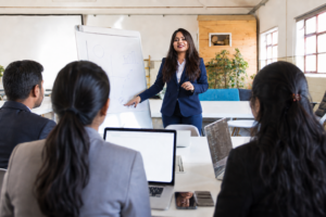 Prabjit Kaur delivering a social media and branding training session to a group